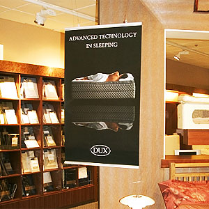 Poster holder hanging graphic panels